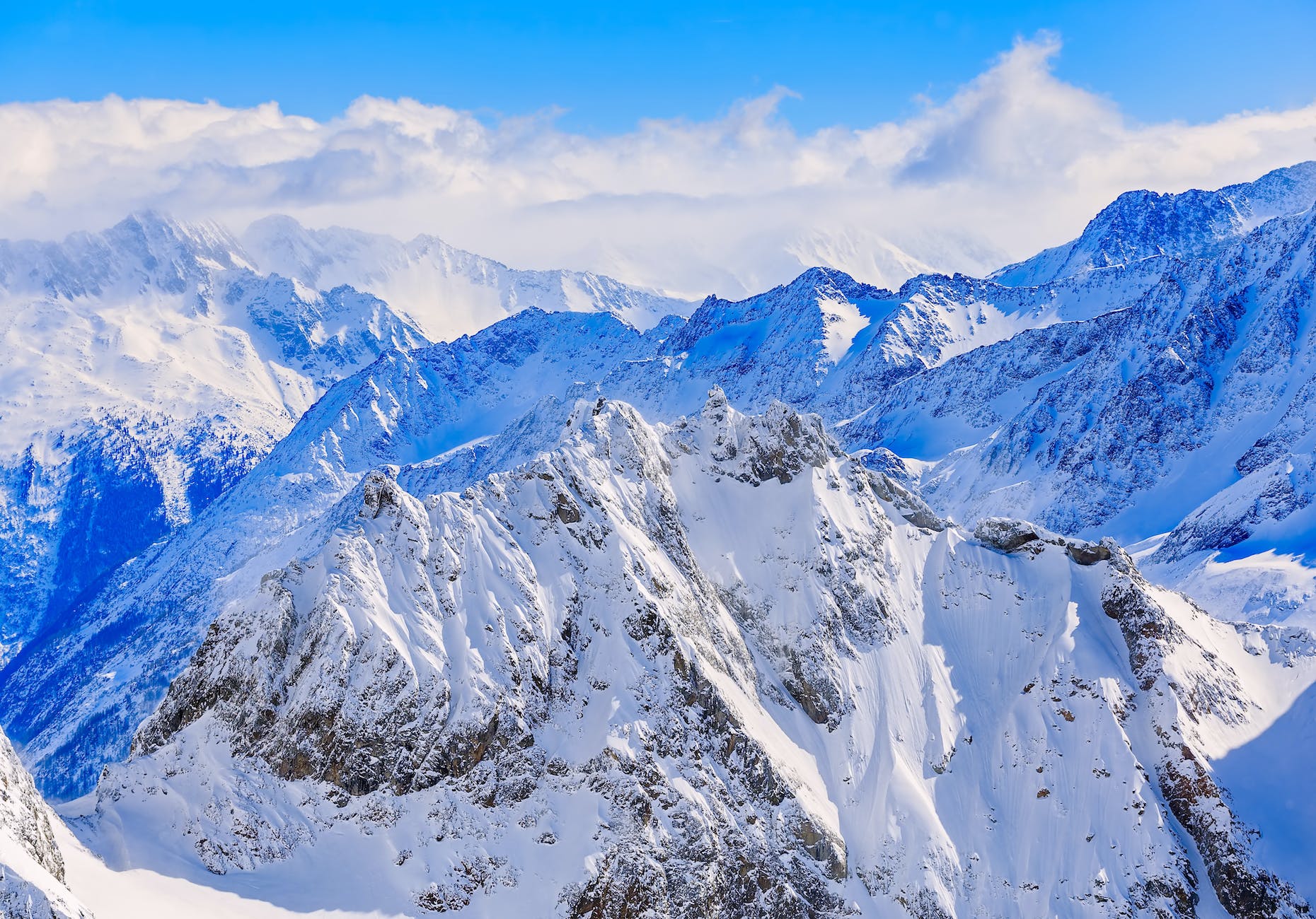 mountain ranges covered in snow